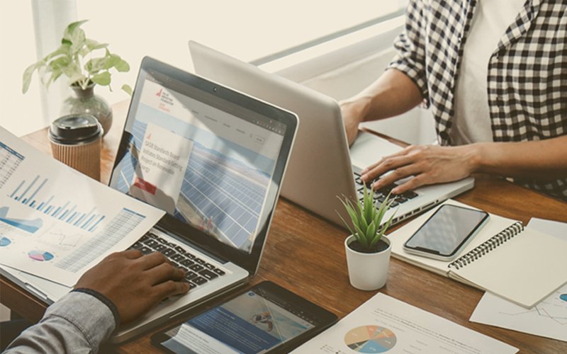 Designer reviewing website mockups